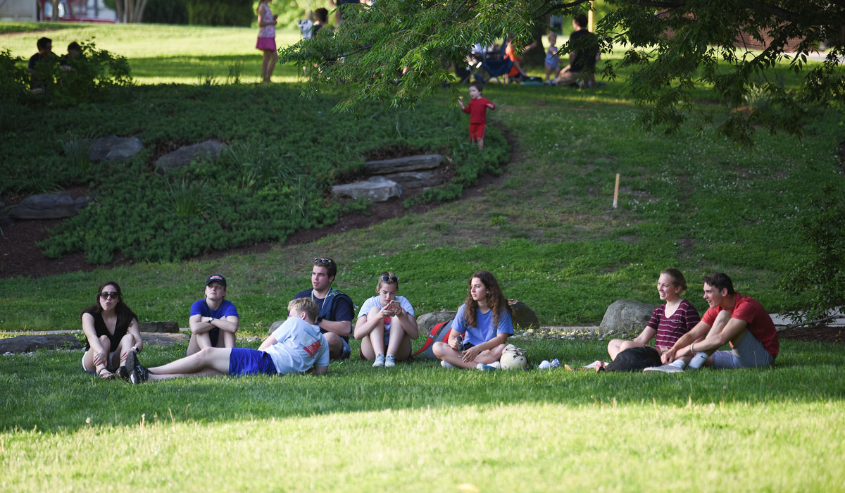 Students sitting on the lawn
